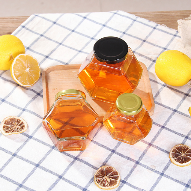 wholesale custom logo printing stock hexagon storage nuts canning spice container glass jars for honey