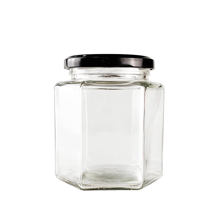 wholesale customized high quality Hexagonal Honey Jam Glass Jar gourmet hex Jars with screw tin Cap for food, candy, honey