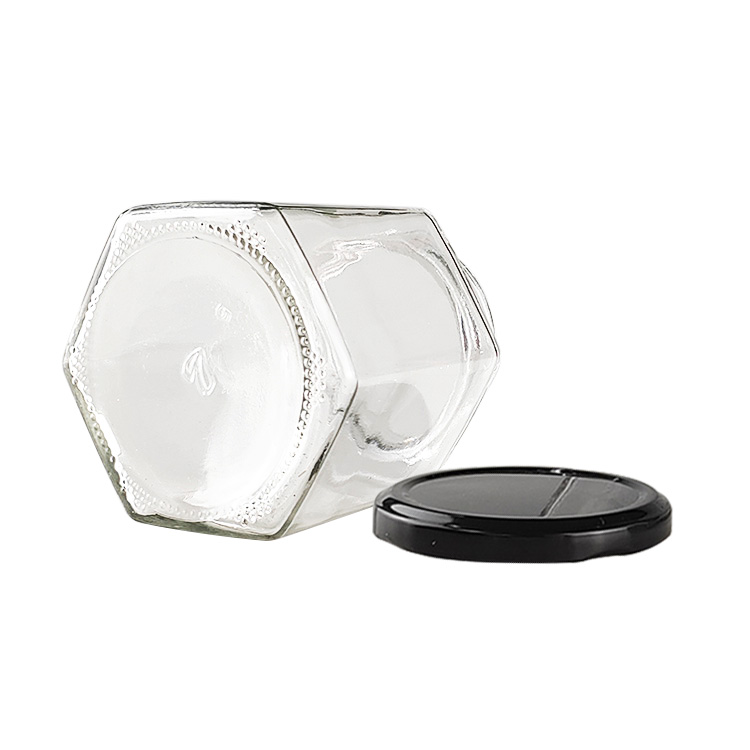 wholesale customized high quality Hexagonal Honey Jam Glass Jar gourmet hex Jars with screw tin Cap for food, candy, honey