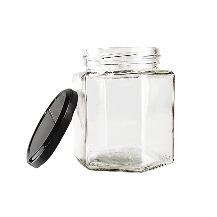 wholesale customized high quality Hexagonal Honey Jam Glass Jar gourmet hex Jars with screw tin Cap for food, candy, honey