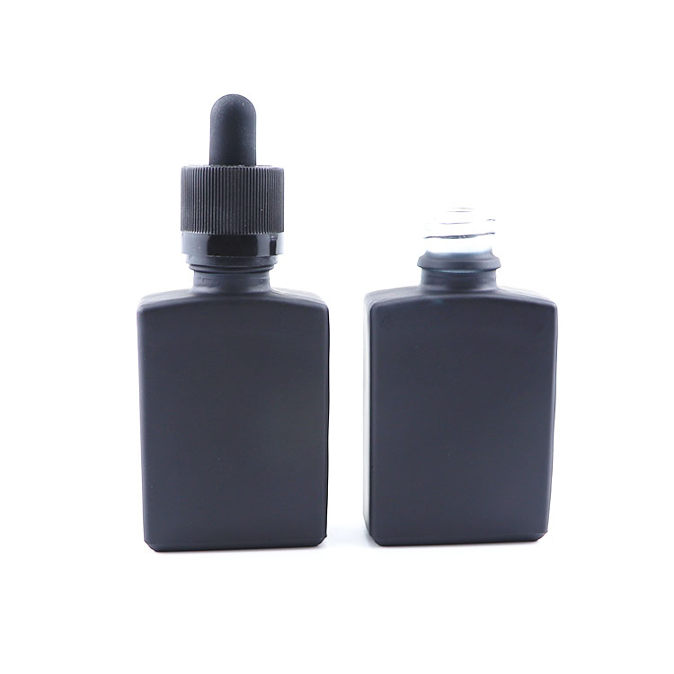 wholesale customized perfume glass dropper bottle empty essential oil rectangular black glass bottle 15ml 30ml 50ml 100ml