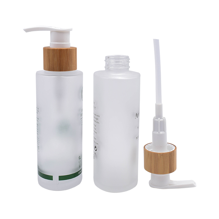 wholesale eco friendly cosmetic lotion serum glass bottle with bamboo pump