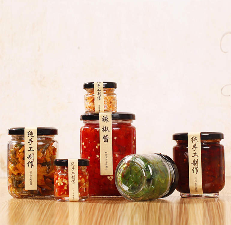 wholesale food glass storage jar 250 gram glass jar with Golden Metal airtight lid cylinder jar