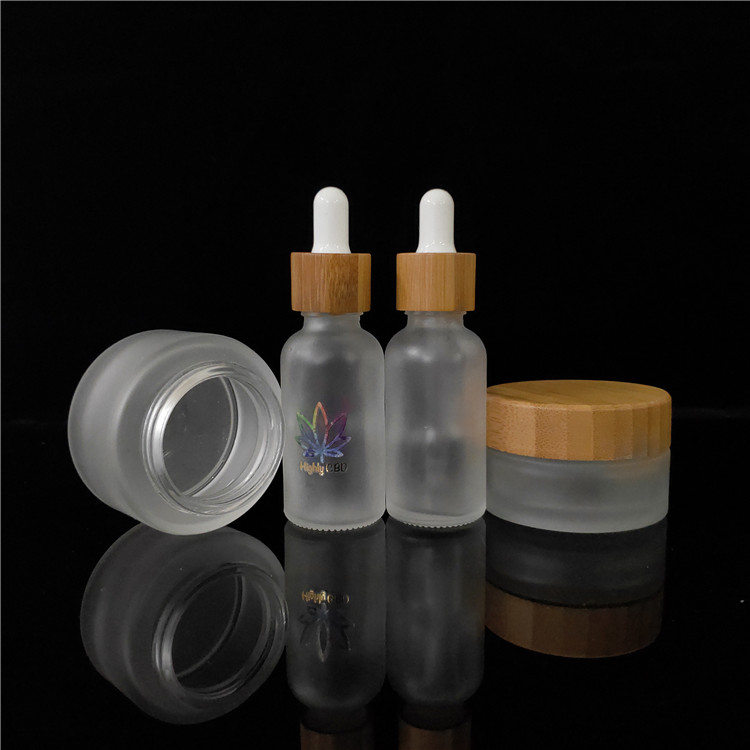 wholesale frosted cosmetic glass jar 50ml 100ml with bamboo lid frasco de vidrio bocal verre