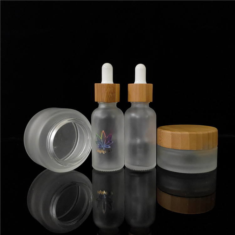 wholesale frosted cosmetic glass jar 50ml 100ml with bamboo lid frasco de vidrio bocal verre