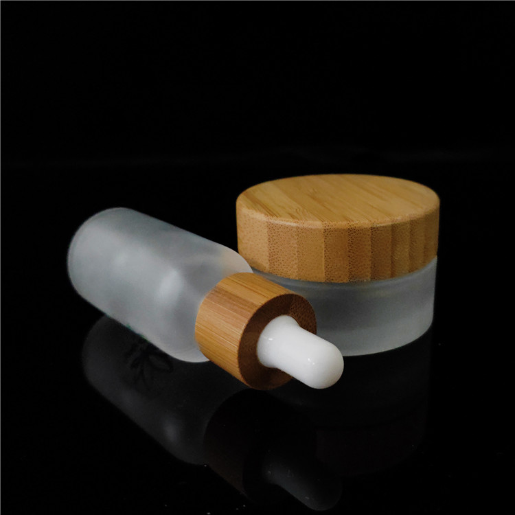wholesale frosted cosmetic glass jar 50ml 100ml with bamboo lid frasco de vidrio bocal verre