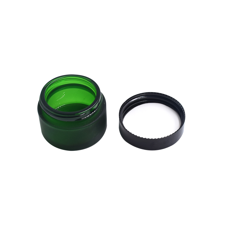 wholesale frosted green glass container black lid cosmetic cream lotion glass jar