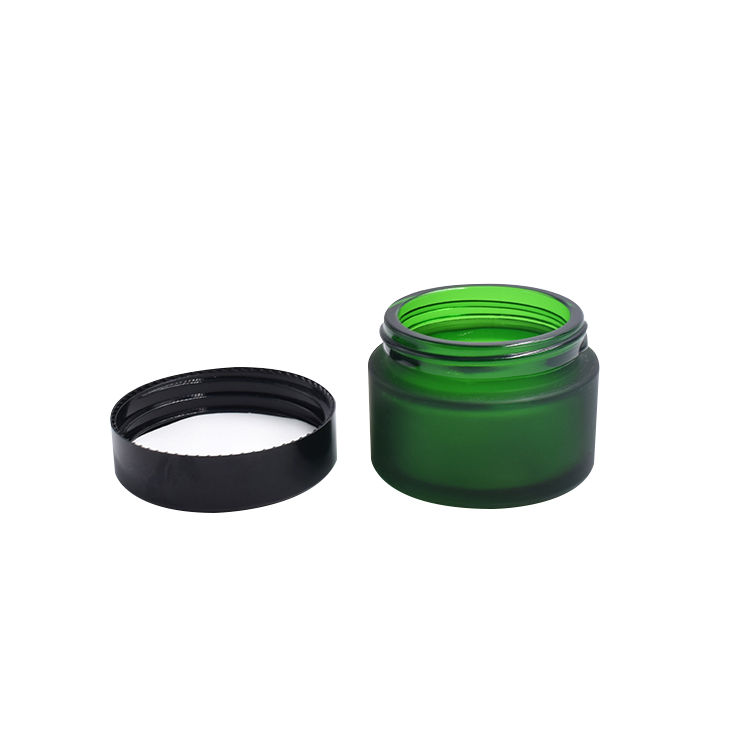 wholesale frosted green glass container black lid cosmetic cream lotion glass jar