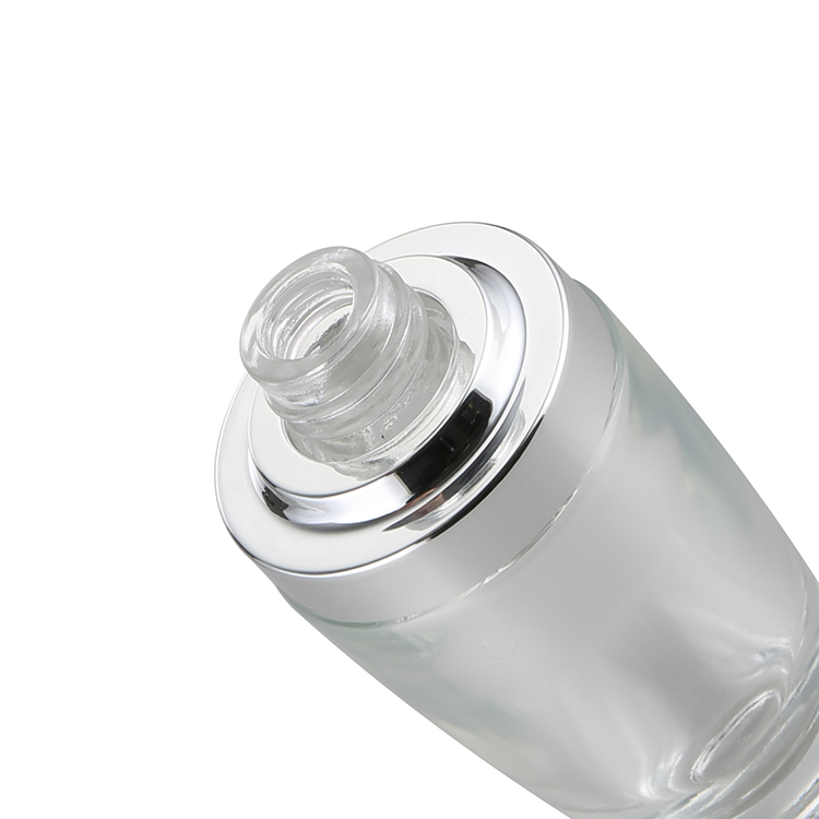 wholesale glass bottles 30ml clear essential oil pippette dropper bottle with silver UV dropper press pump drop