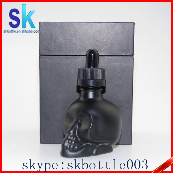 wholesale glass bottles hot sale black dropper bottle glass skull 30ml glass dropper bottles black matte with packing tube