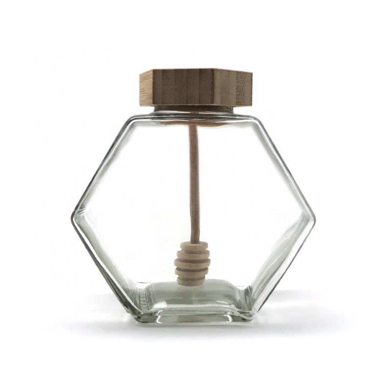 wholesale glass hexagon honey storage jar glass honey jar with wooden stirrer
