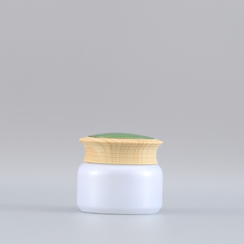 wholesale green luxury cosmetic glass jar 50ml cream jar containers with glass jar bamboo lids