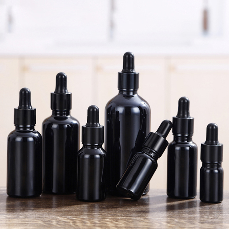wholesale high quality empty black glass boston dropper bottles with black cap for essential oils