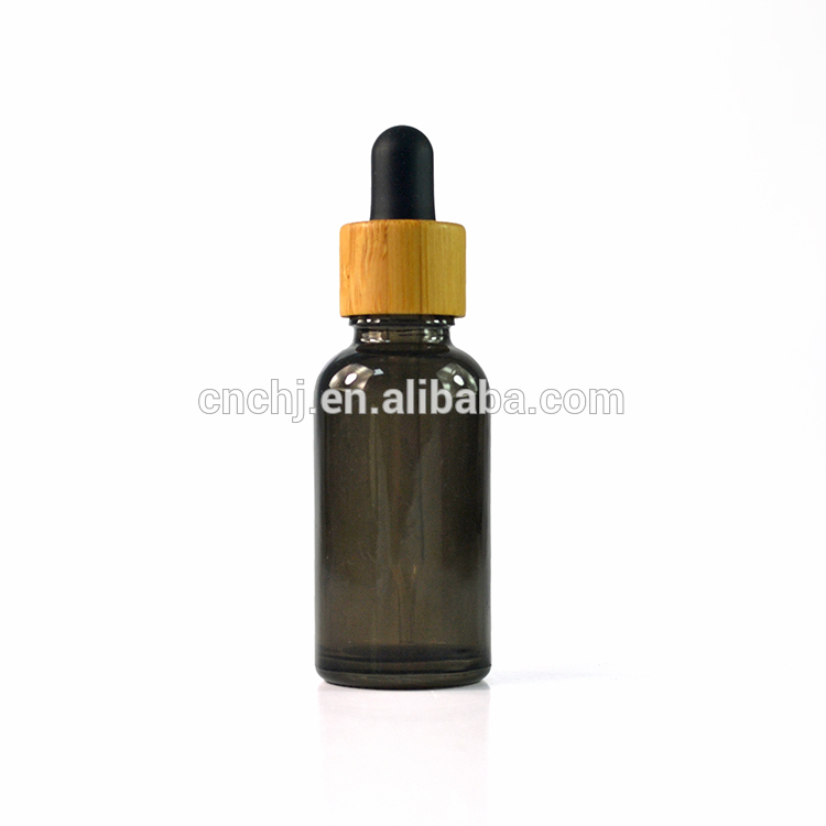 wholesale hot sale 30ml 1oz glass dropper bottle with bamboo cap in stock
