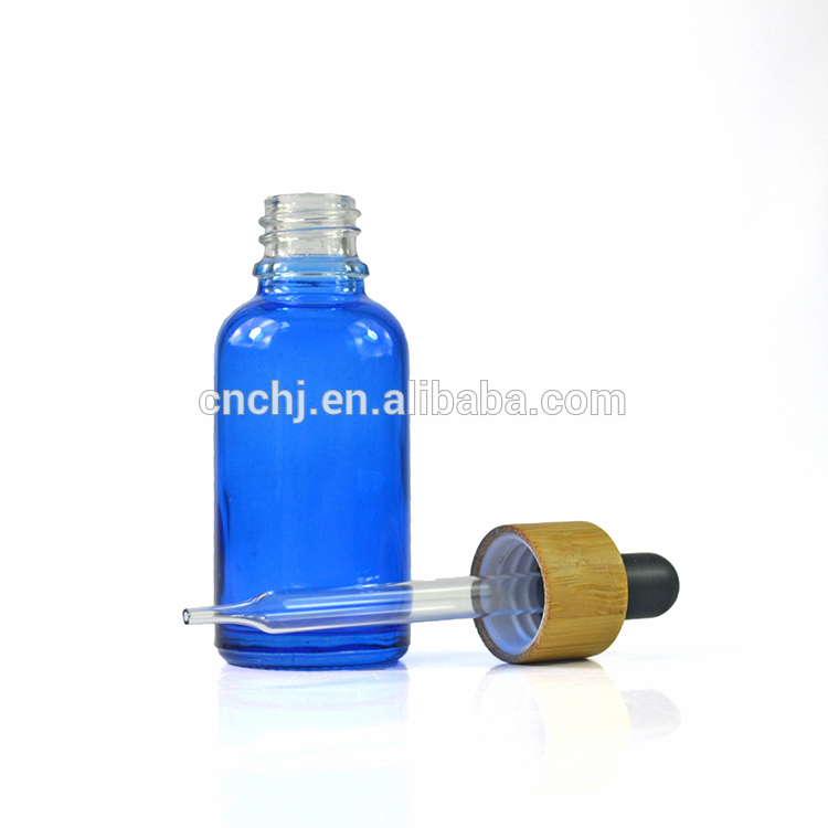 wholesale hot sale 30ml 1oz glass dropper bottle with bamboo cap in stock
