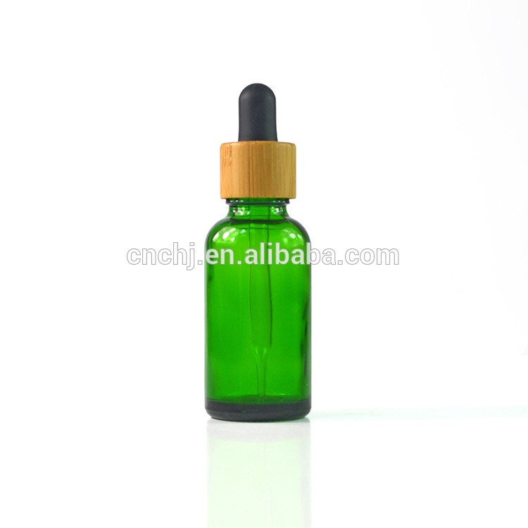 wholesale hot sale 30ml 1oz glass dropper bottle with bamboo cap in stock