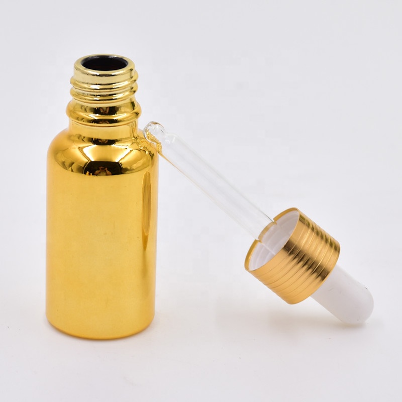 wholesale luxury 30ml gold electroplated cosmetic glass essential oil bottles cosmetic package with dropper pump sprayer lid