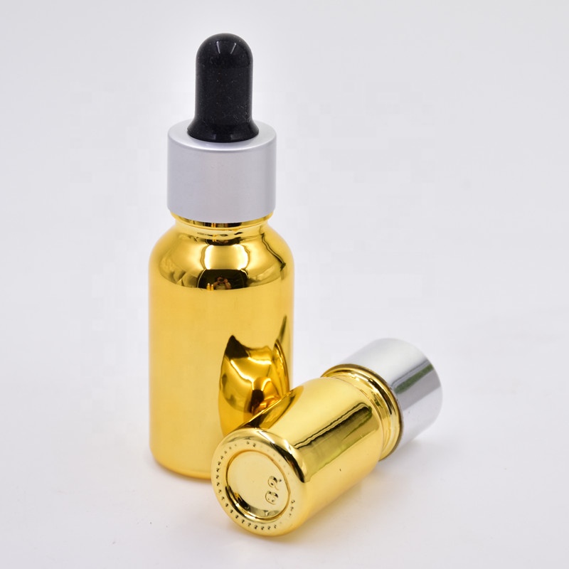 wholesale luxury 30ml gold electroplated cosmetic glass essential oil bottles cosmetic package with dropper pump sprayer lid
