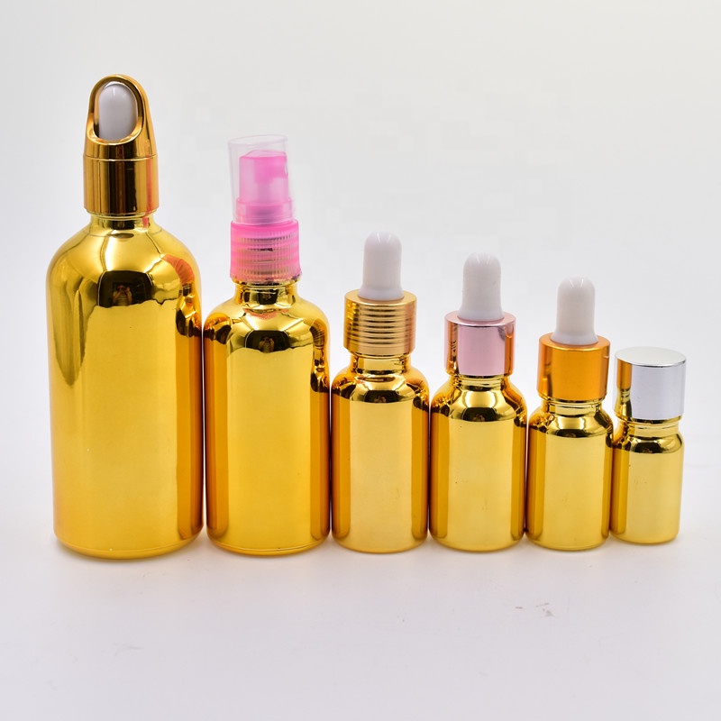 wholesale luxury 30ml gold electroplated cosmetic glass essential oil bottles cosmetic package with dropper pump sprayer lid