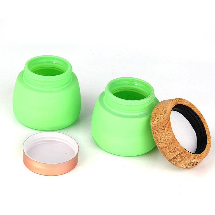 wholesale matte green face pack glass container and jar with bamboo wooden lid