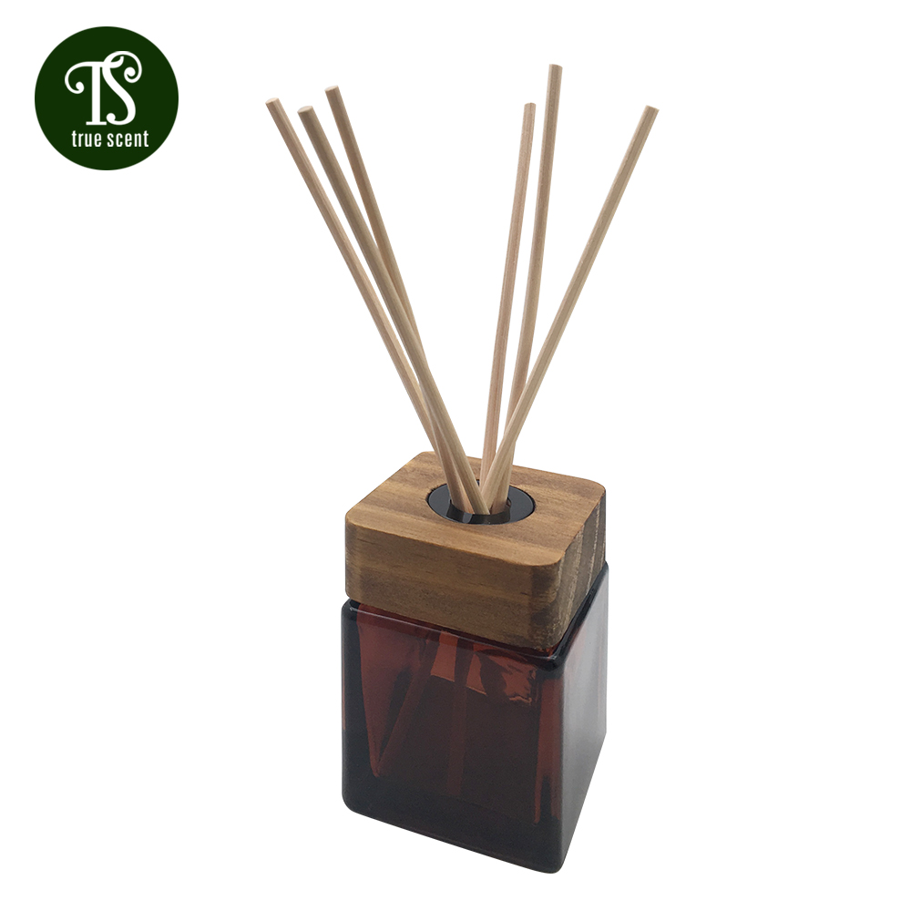 wholesale private logo 100ml wooden top amber rattan reed diffuser bottle with gift box for home fragrance and hotel air fresh