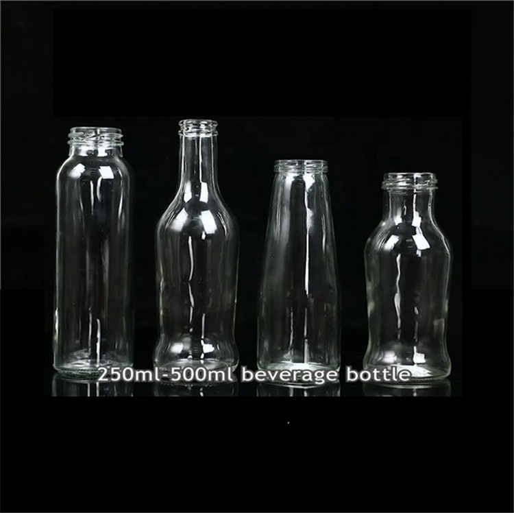 wholesale recycled empty clear glass milk juice beverage bollte with metal cap
