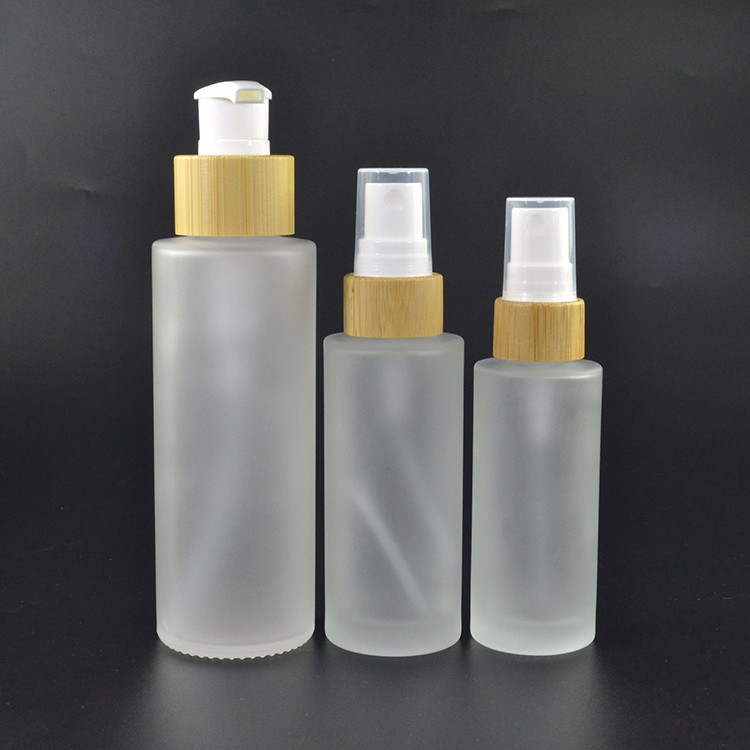 wholesales perfume essential oil 30ml 50ml 100ml 120ml 150ml frosted glass cosmetic bottle with bamboo spray or pump cap