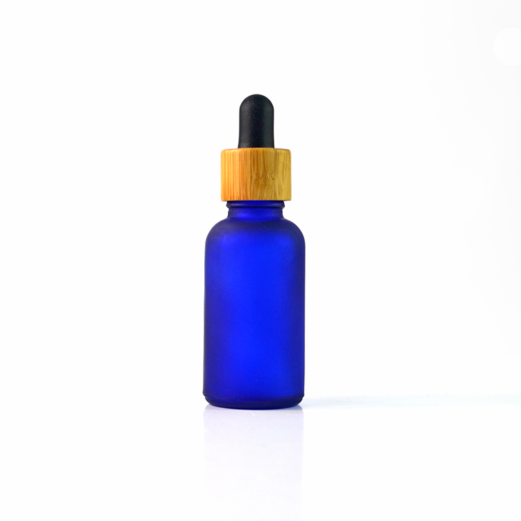 wooden bamboo cap frosted amber blue clear and green glass dropper bottle 30 ml for essential oil