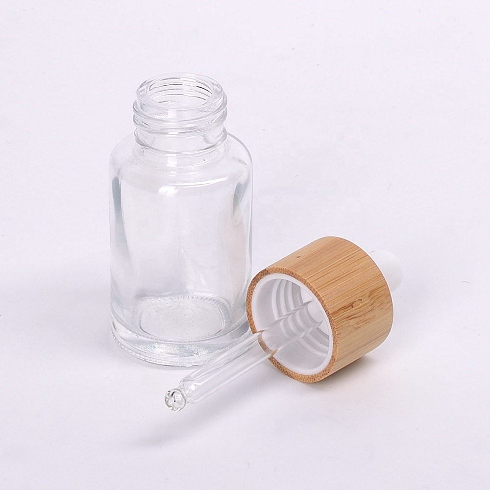 wooden packaging 30ml 50ml 100ml empty glass bottle bamboo cap body lotion spray pump glass with bamboo lid